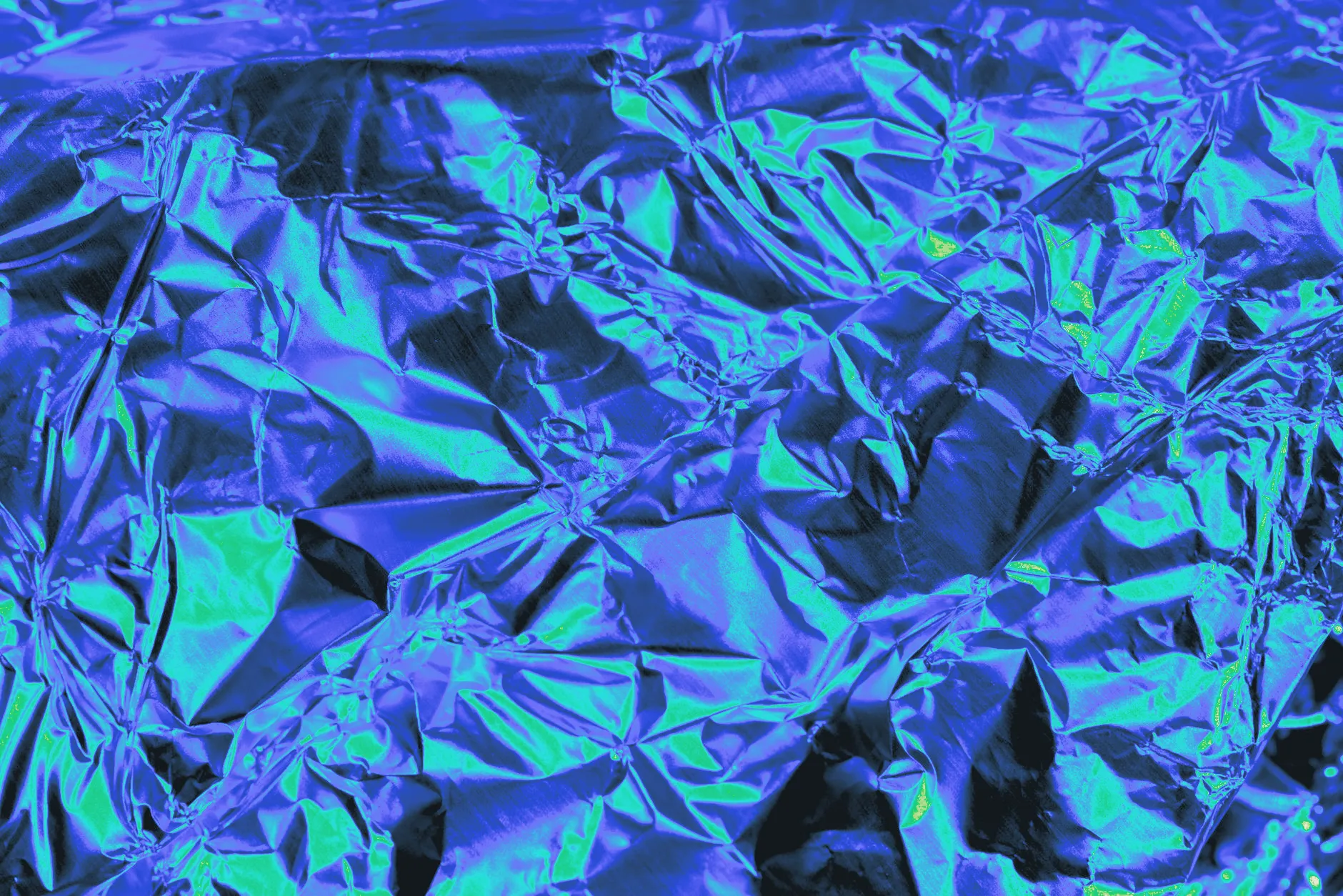 Crumpled aluminum foil shown close up in texture