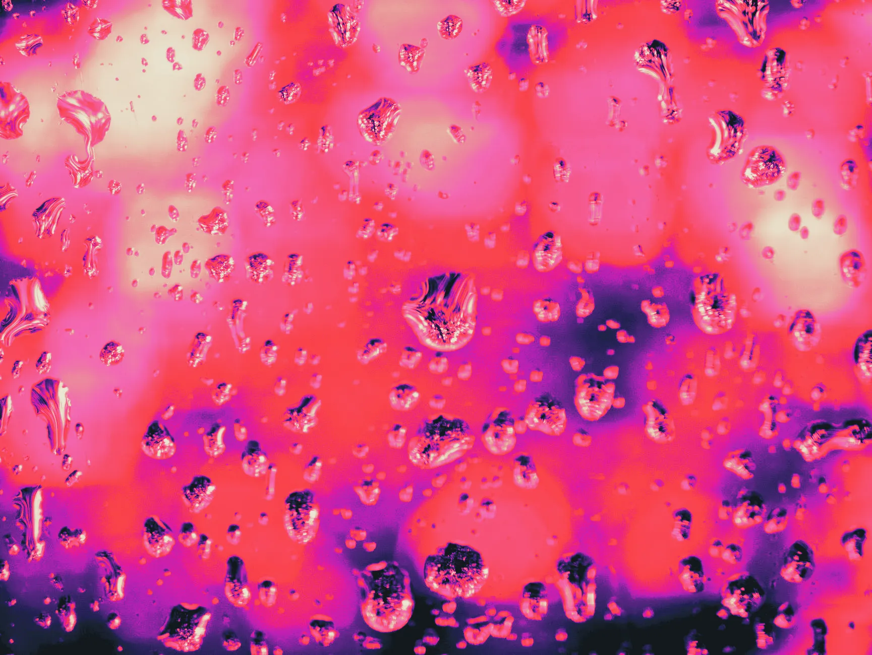 Water droplets on glass during a shower