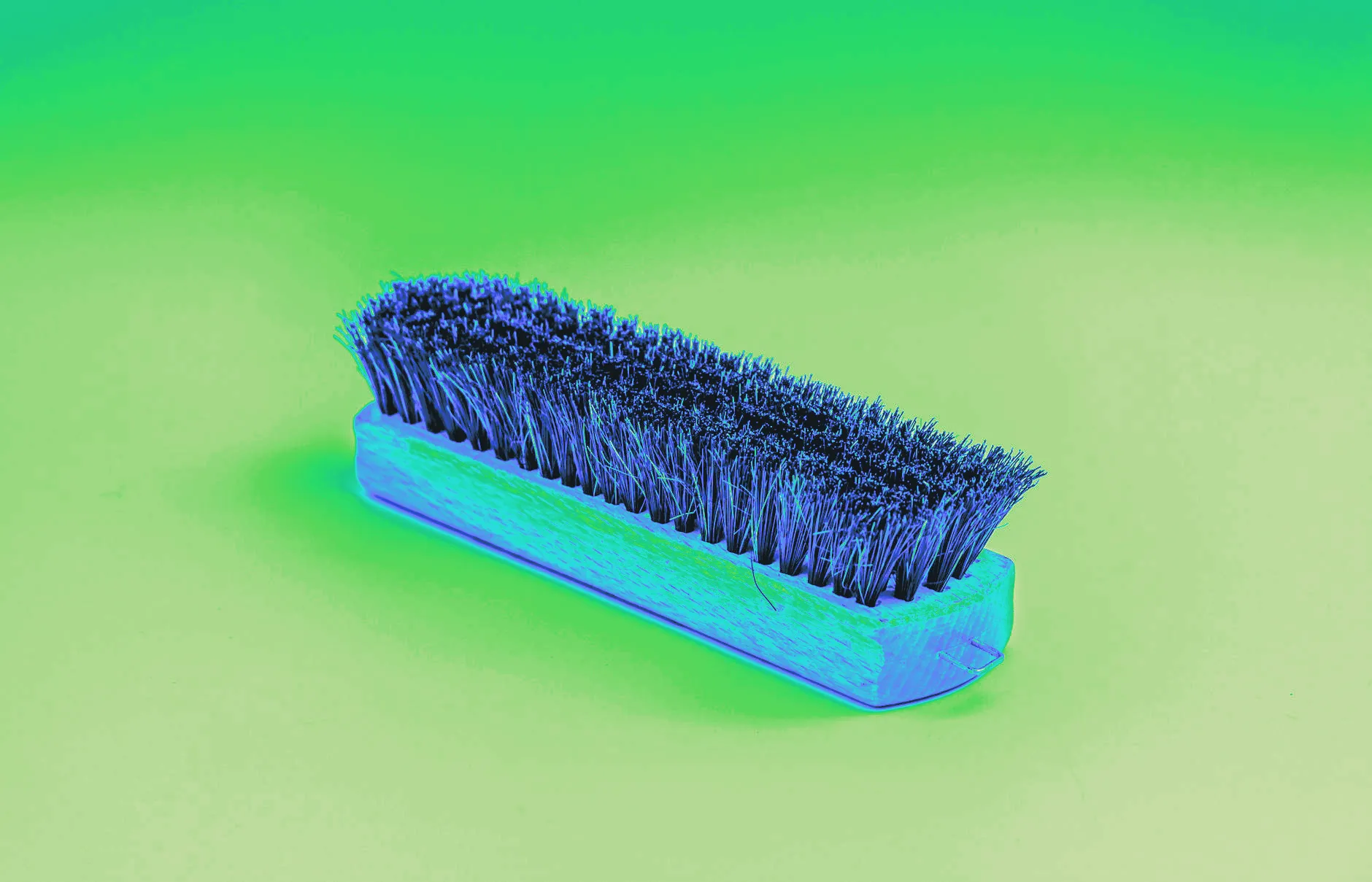 A scrub brush's bristles shown close up